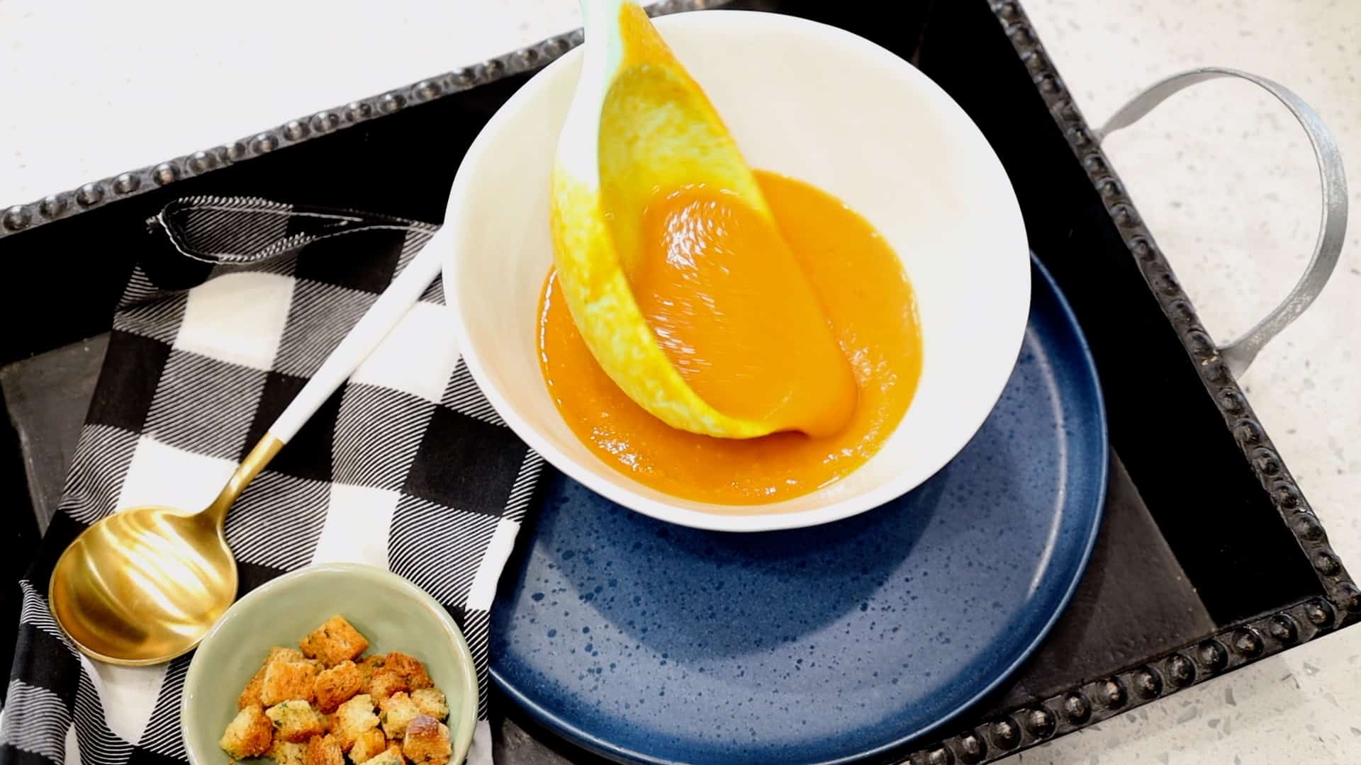 serving tomato basil bisque