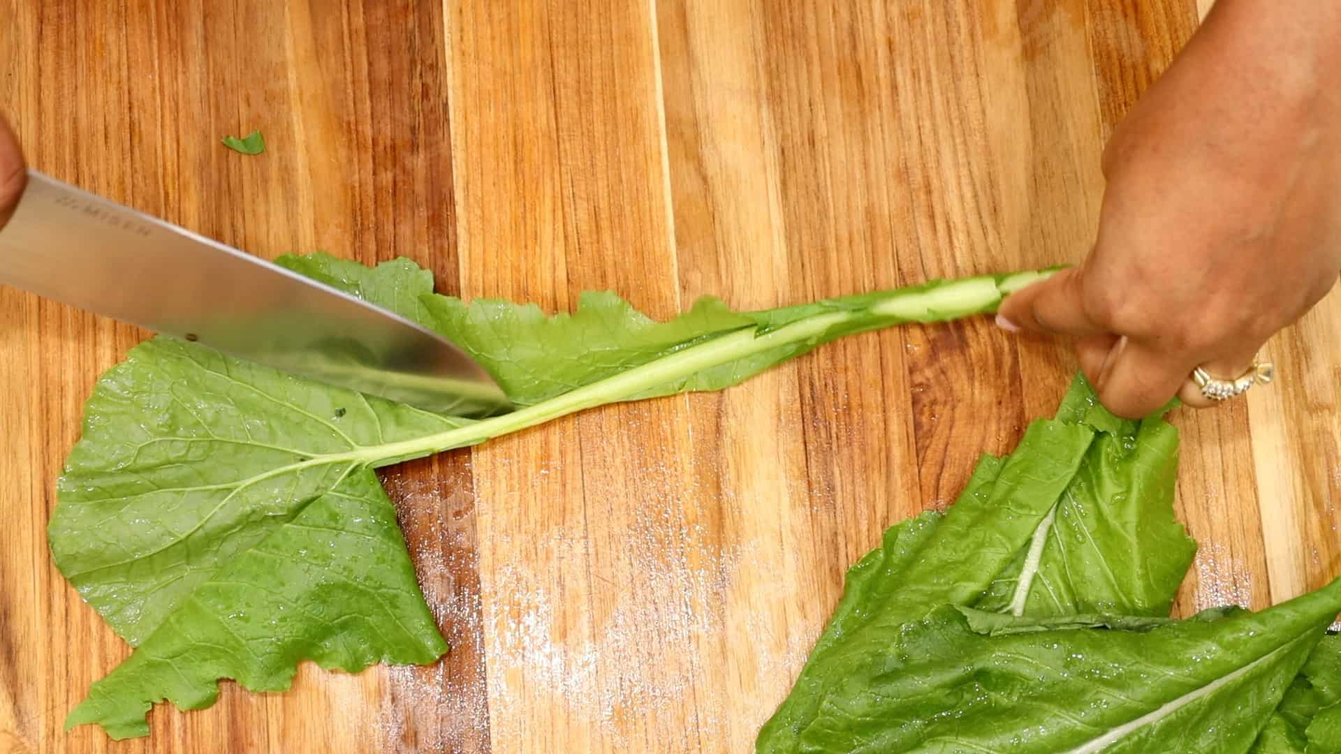 slicing turnip leaves
