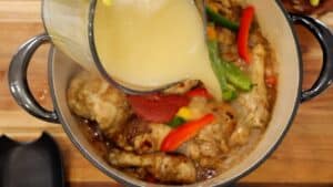 Adding liquid and spice to chicken