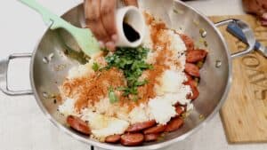 Adding seasoning and herbs with soy sauce