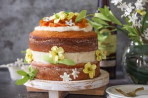 Haitian Rum Cake on a wooden stand