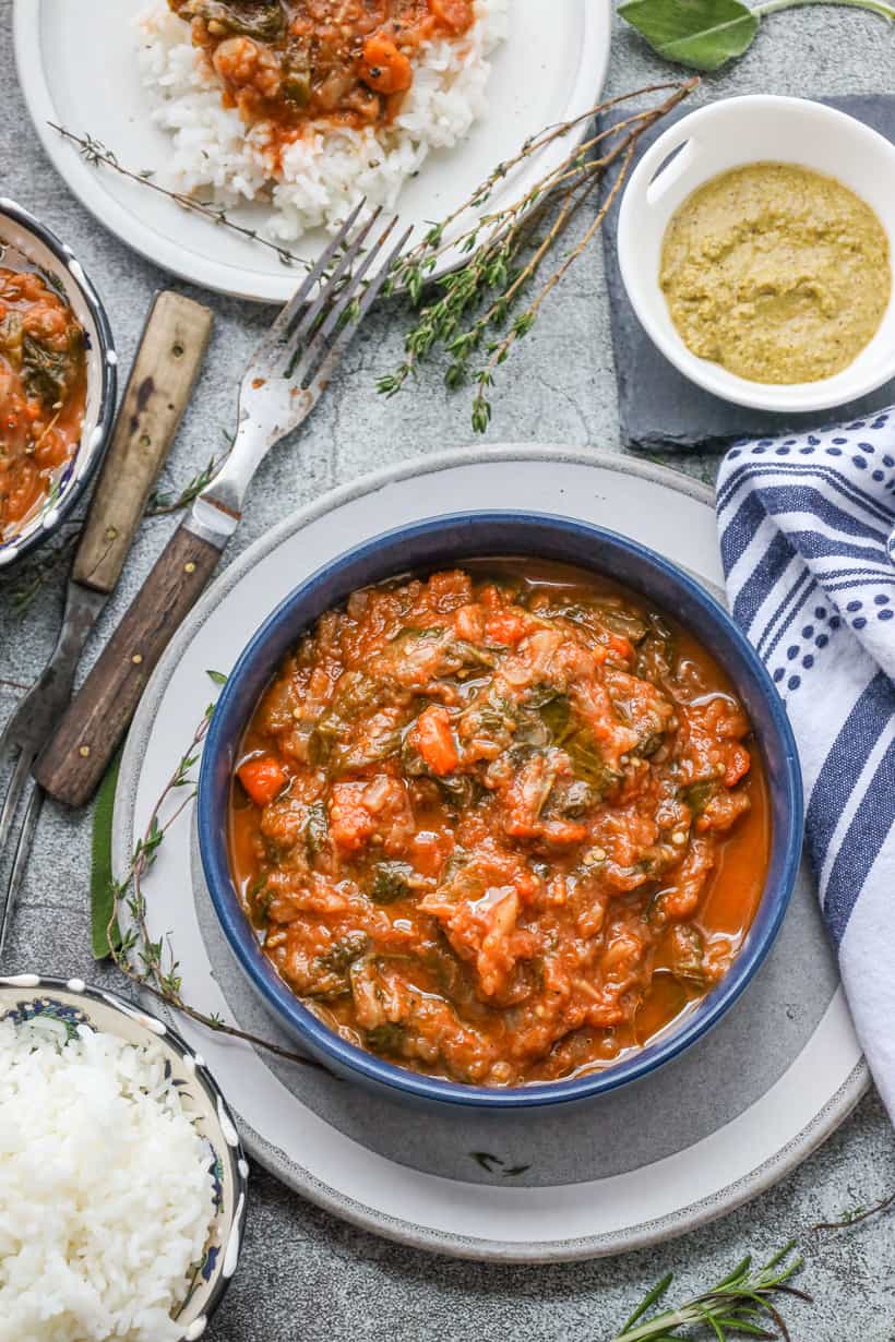 Haitian Legume in a blue bowl with rice