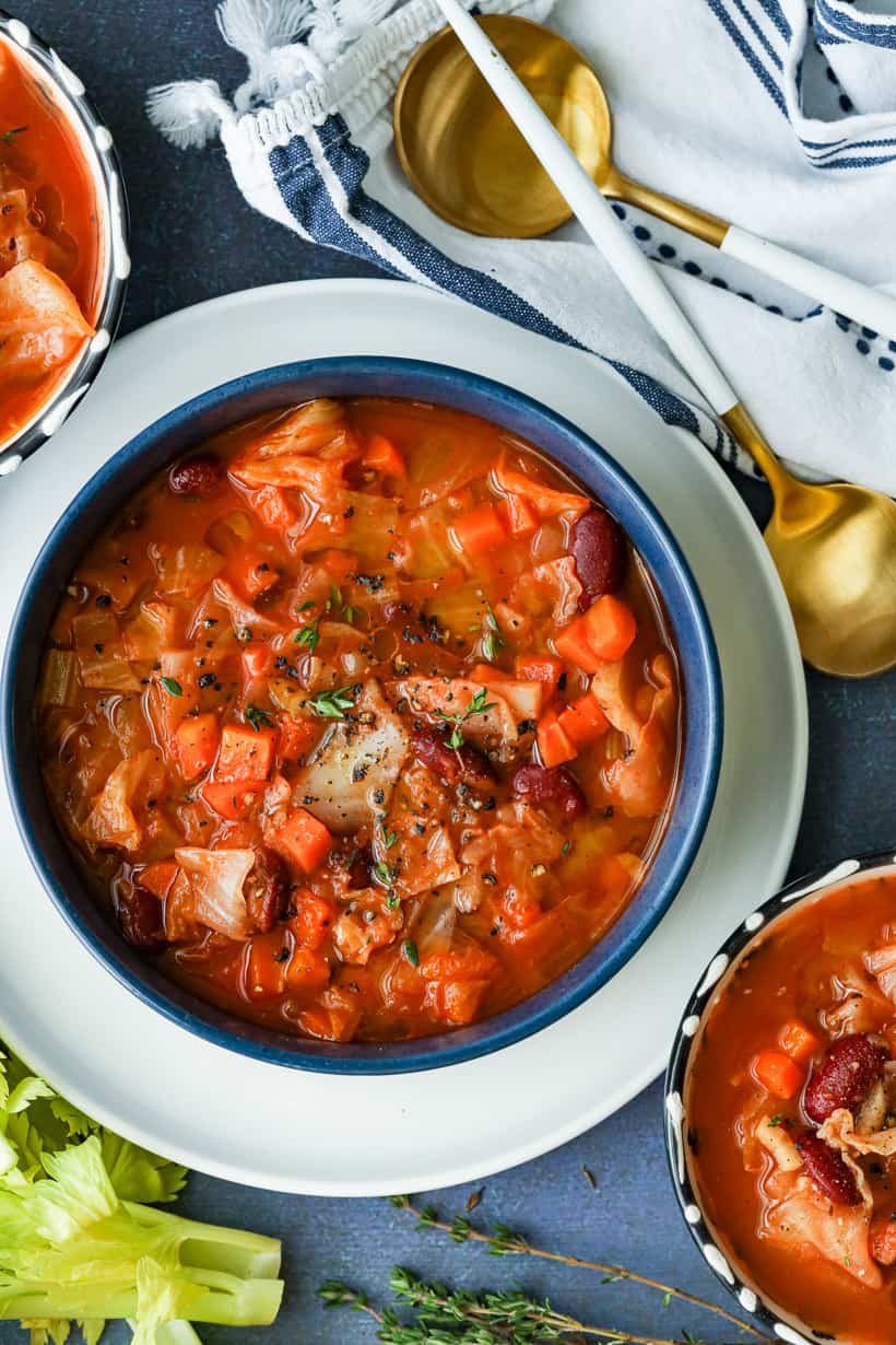 Instant Pot Cabbage Soup topped with herbs