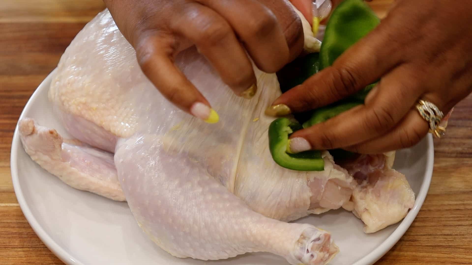 Stuffing chicken with Peppers and onions
