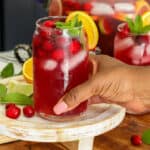 hand holding non-alcoholic sangria Mocktail
