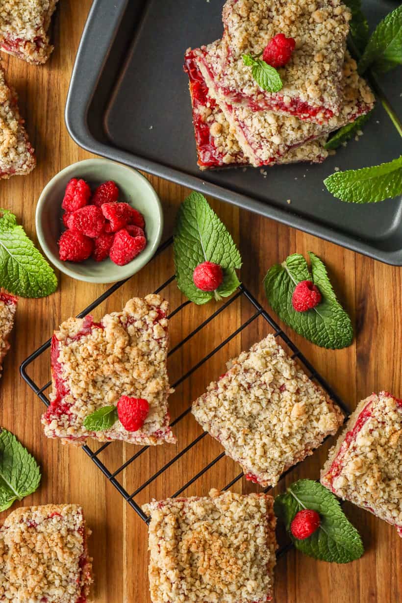 Raspberry Bars on a cooling rack and tray.
