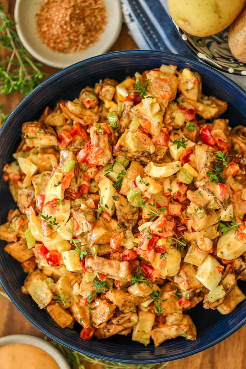 Roasted potato salad in blue bowl