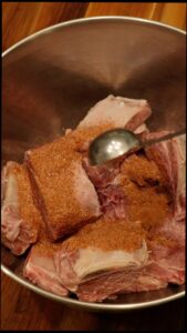 Adding Haitian spice to beef cuts