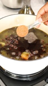 Adding the Jacmel seasoning