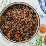 Haitian black beans and rice in pan
