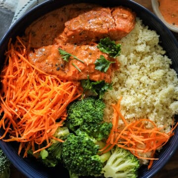 Honey Dijon Salmon bowl with fresh vegetables.