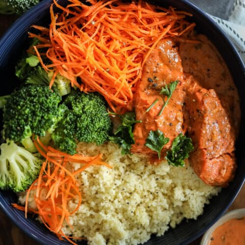 Honey Dijon Salmon bowl with fresh vegetables.