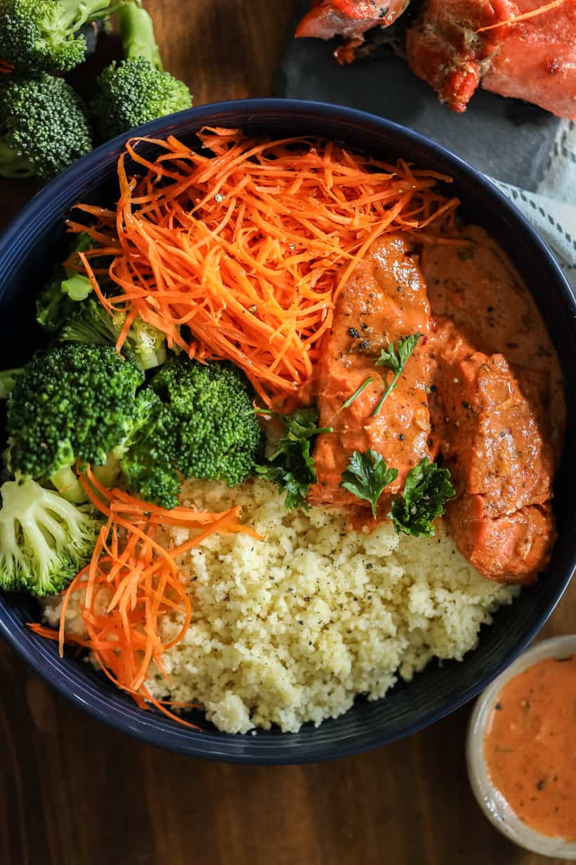 Honey Dijon Salmon bowl with fresh vegetables.