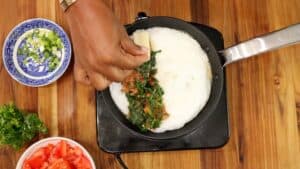 Adding cheese to omelet