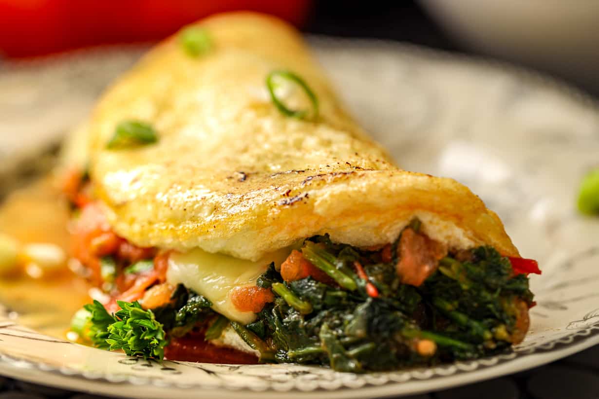 Fluffy egg white omelette (omelet) stuffed with vegetables.