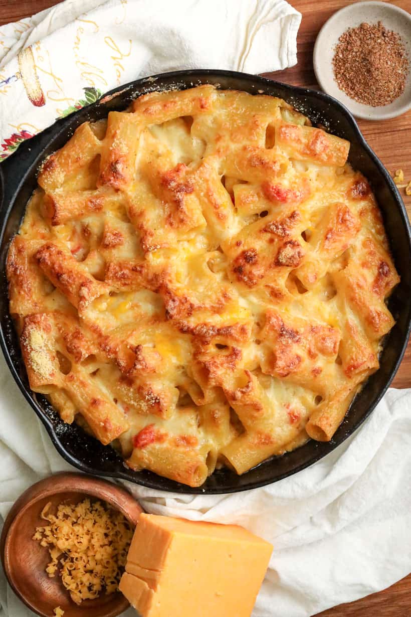 Baked Haitian Macaroni Au Gratin In Skillet on wooden board