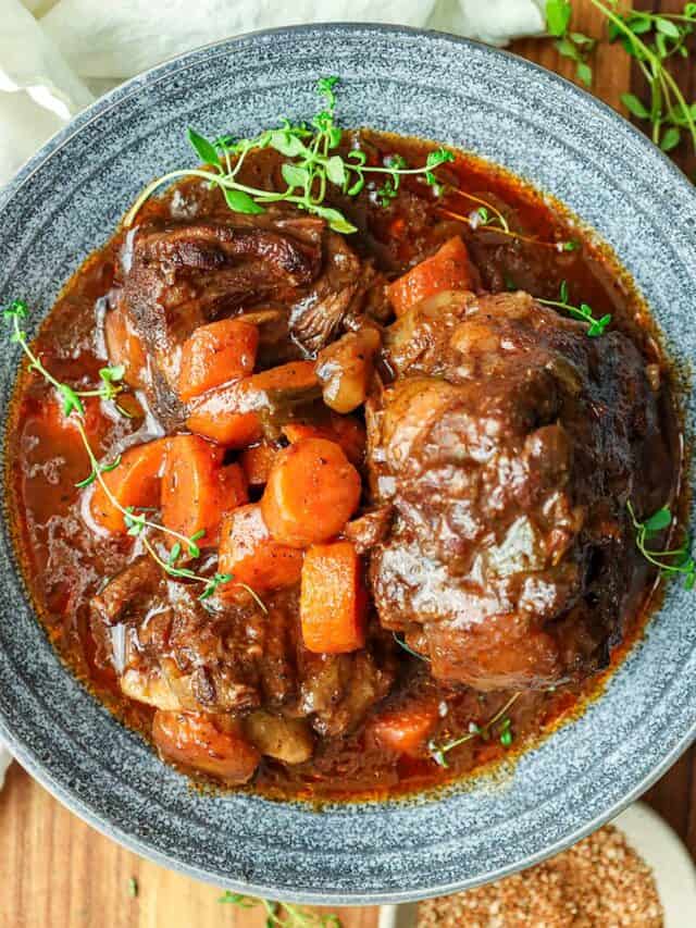Braised Instant Pot Oxtail stew in gray bowl