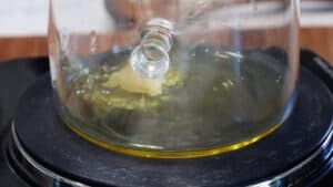Adding garlic to oil