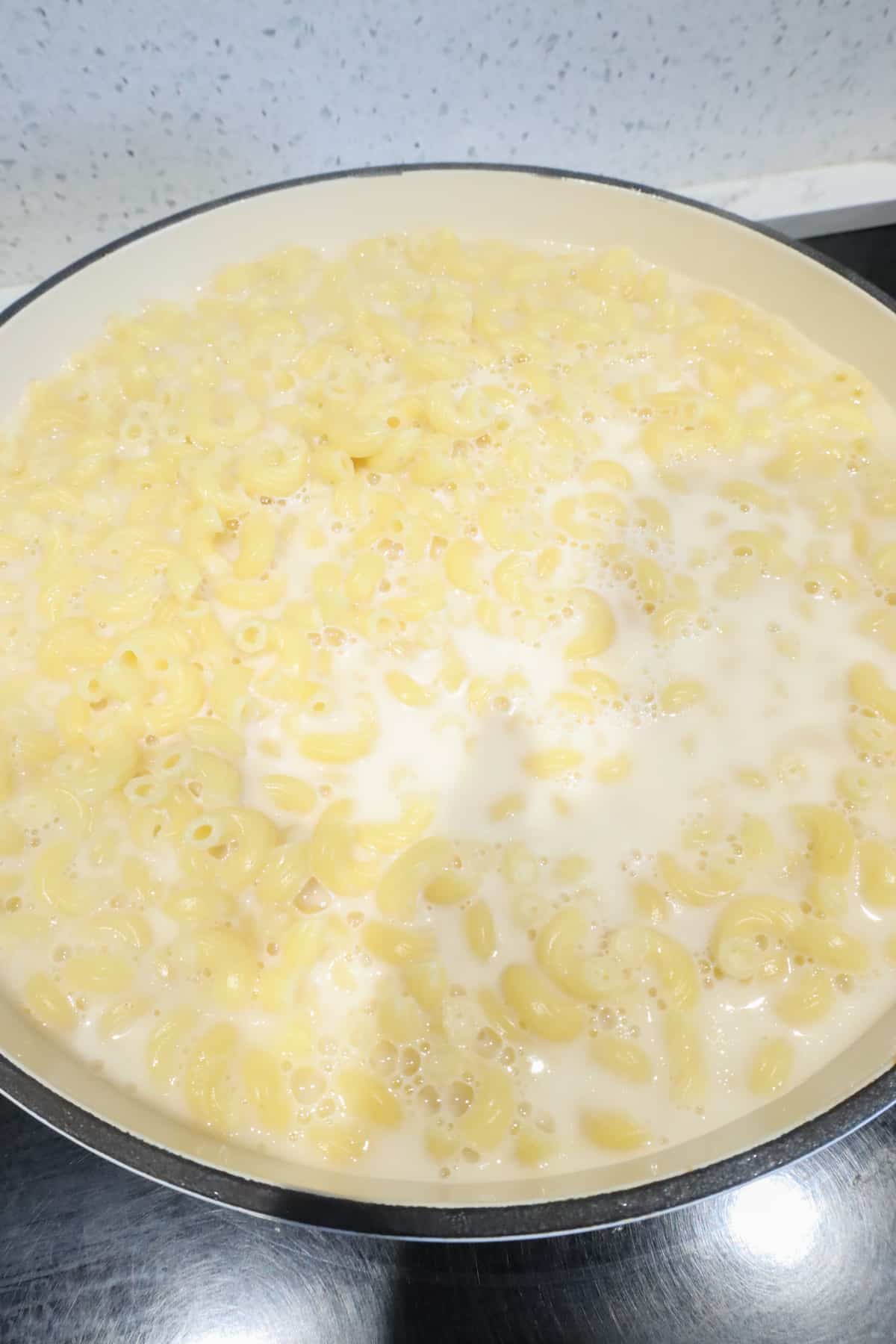 macaroni and milk cooking