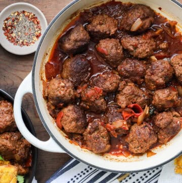 Harissa Meatballs in white skillet