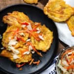 Haitian Fried Plantains topped with Pikliz.