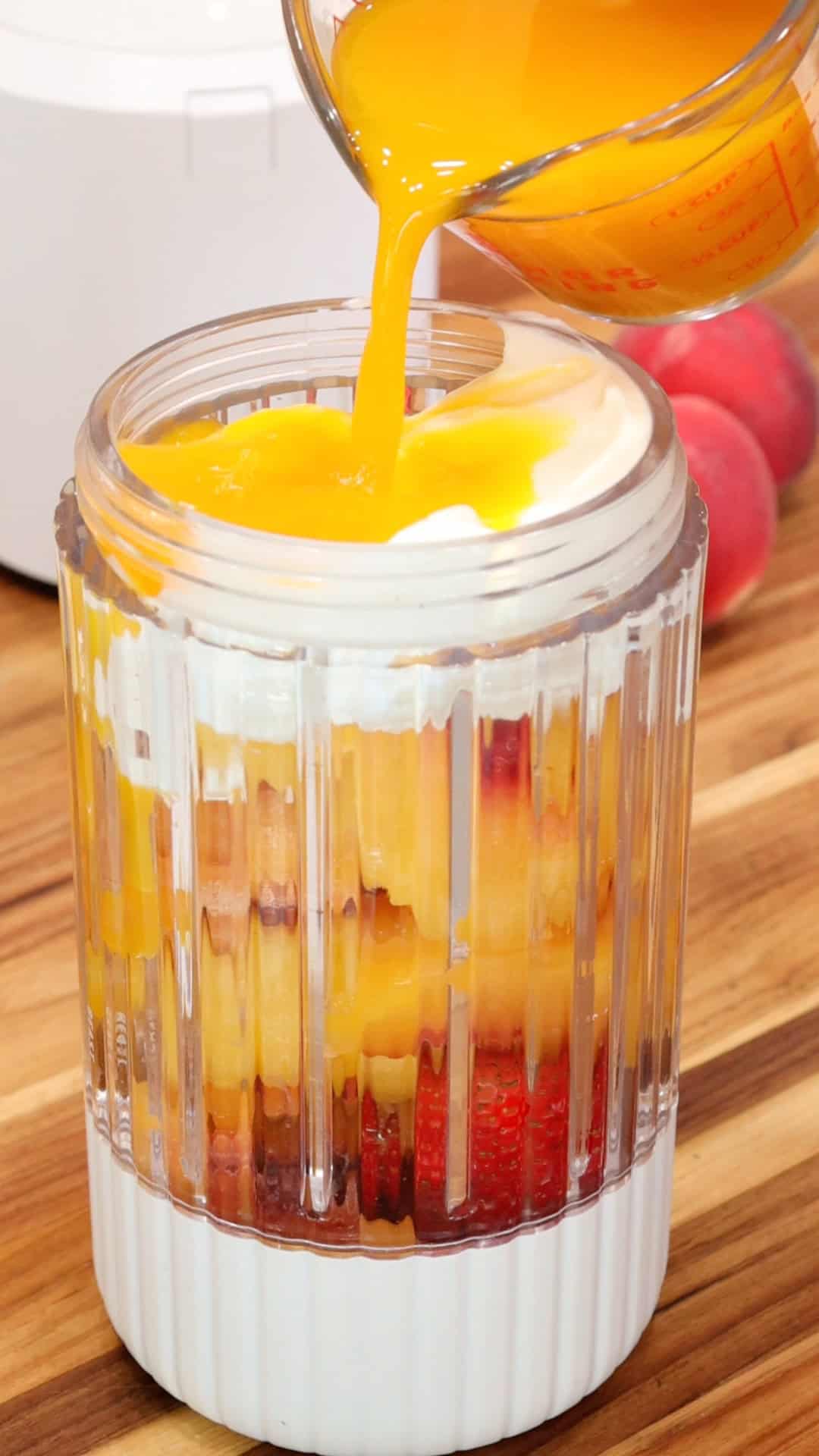 Adding Morning Juice Blend to Peach Smoothie Recipe