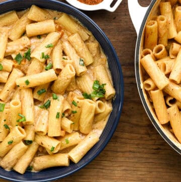 rasta pasta in two bowls with homemade jerk seasoning