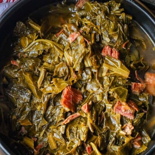 Instant Pot Collard Greens with smoked turkey neck in black bowl.