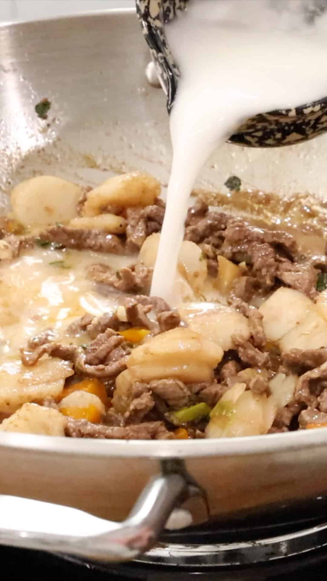 Adding slurry to beef and vegetables