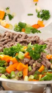 Cooking beef and vegetables