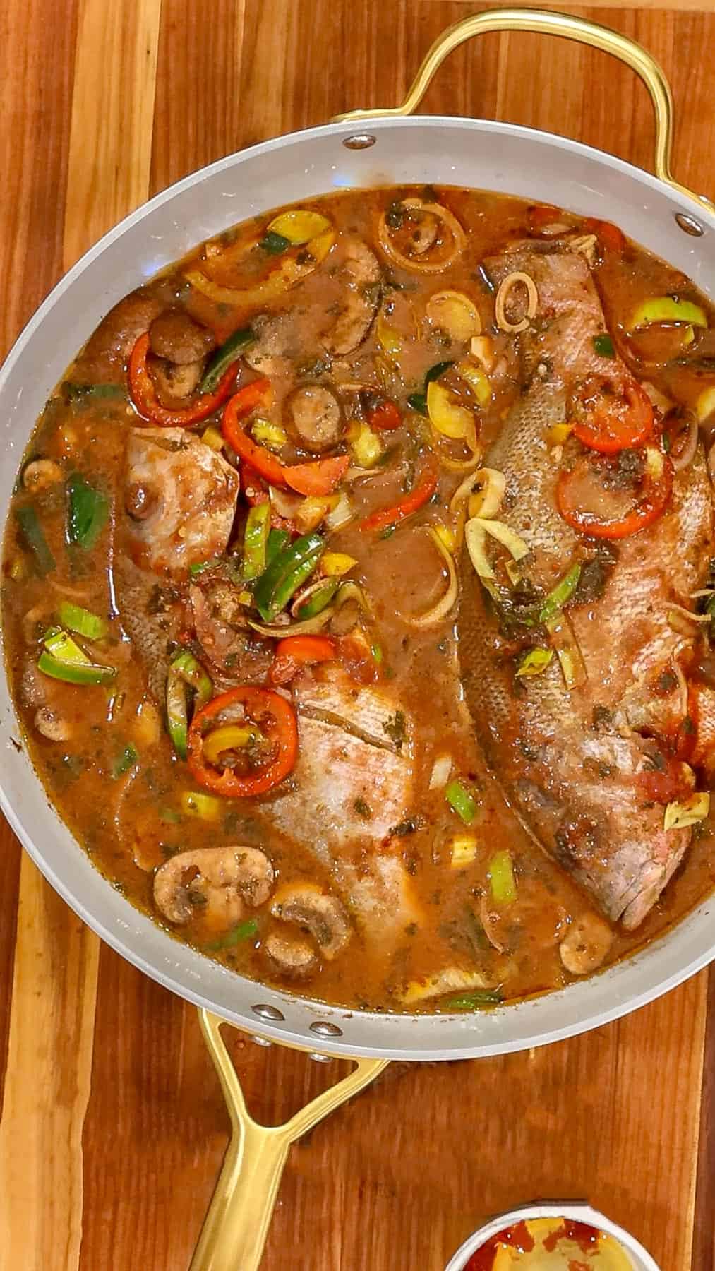 Haitian fish stew in skillet