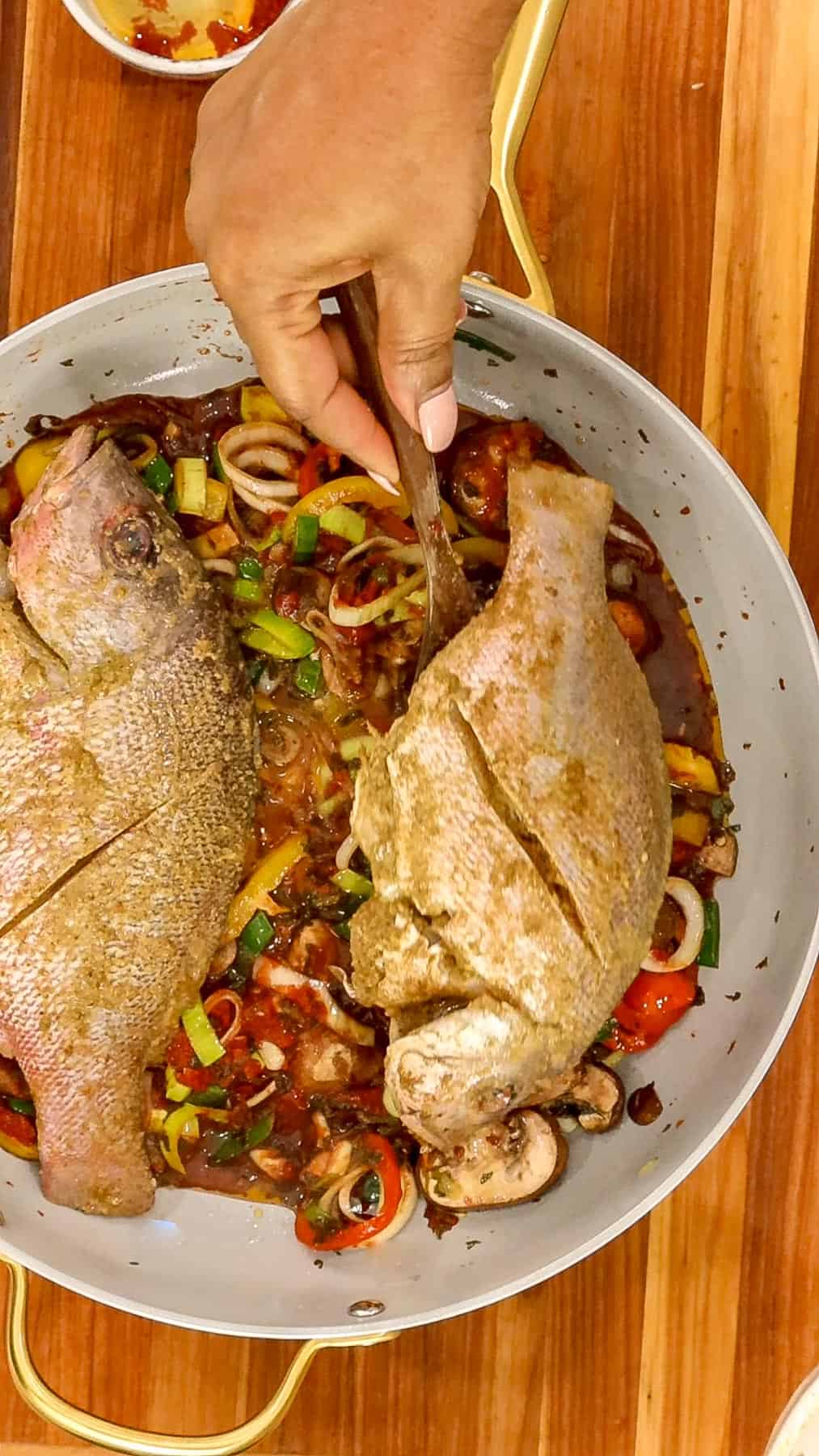 Adding fish to stew