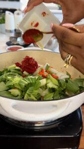 Adding tomatoes to vegetables