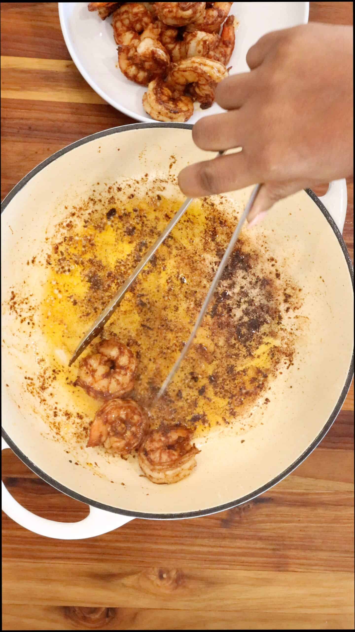 Removing shrimp from pan