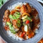 shrimp stew with Bok Choy in gray bowl with white rice