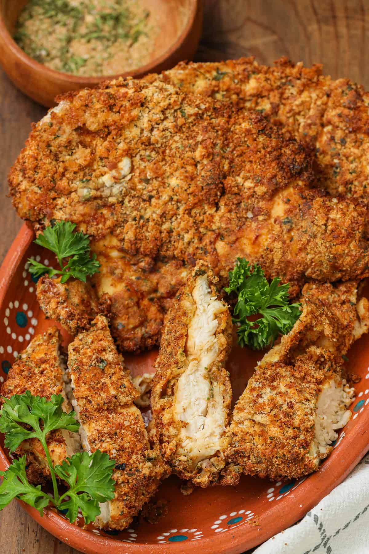 thinly sliced chicken breast with parsley