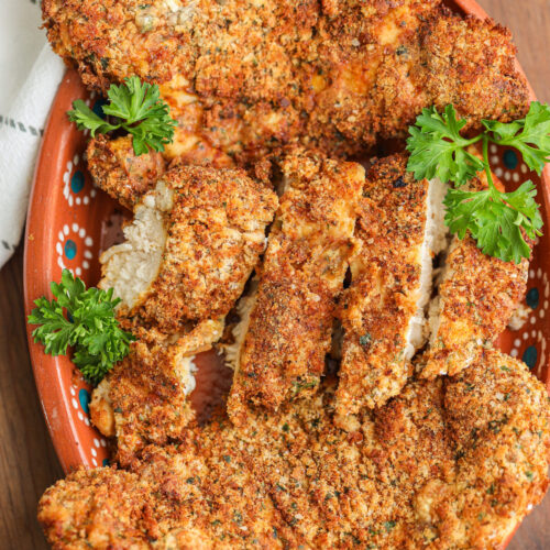 Thinly Sliced Chicken Breast on brown plate