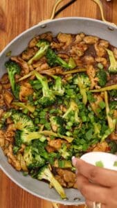 chicken and broccoli stir fry in pan
