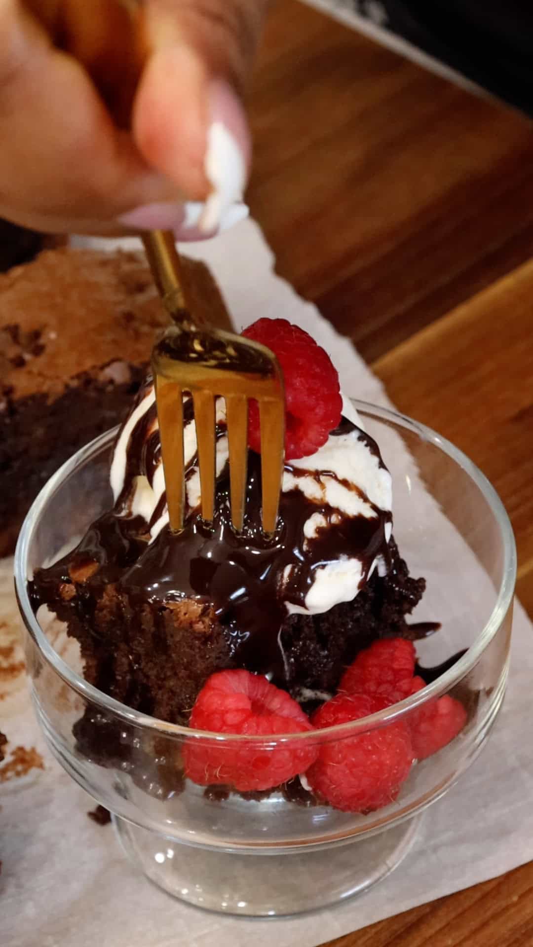 Lifting Chocolate Fudge Brownies with fork