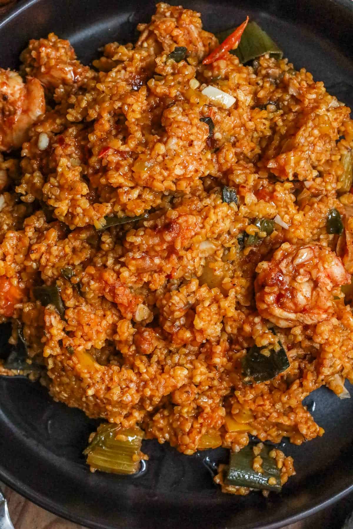 Mayi moulin with shrimp in black bowl