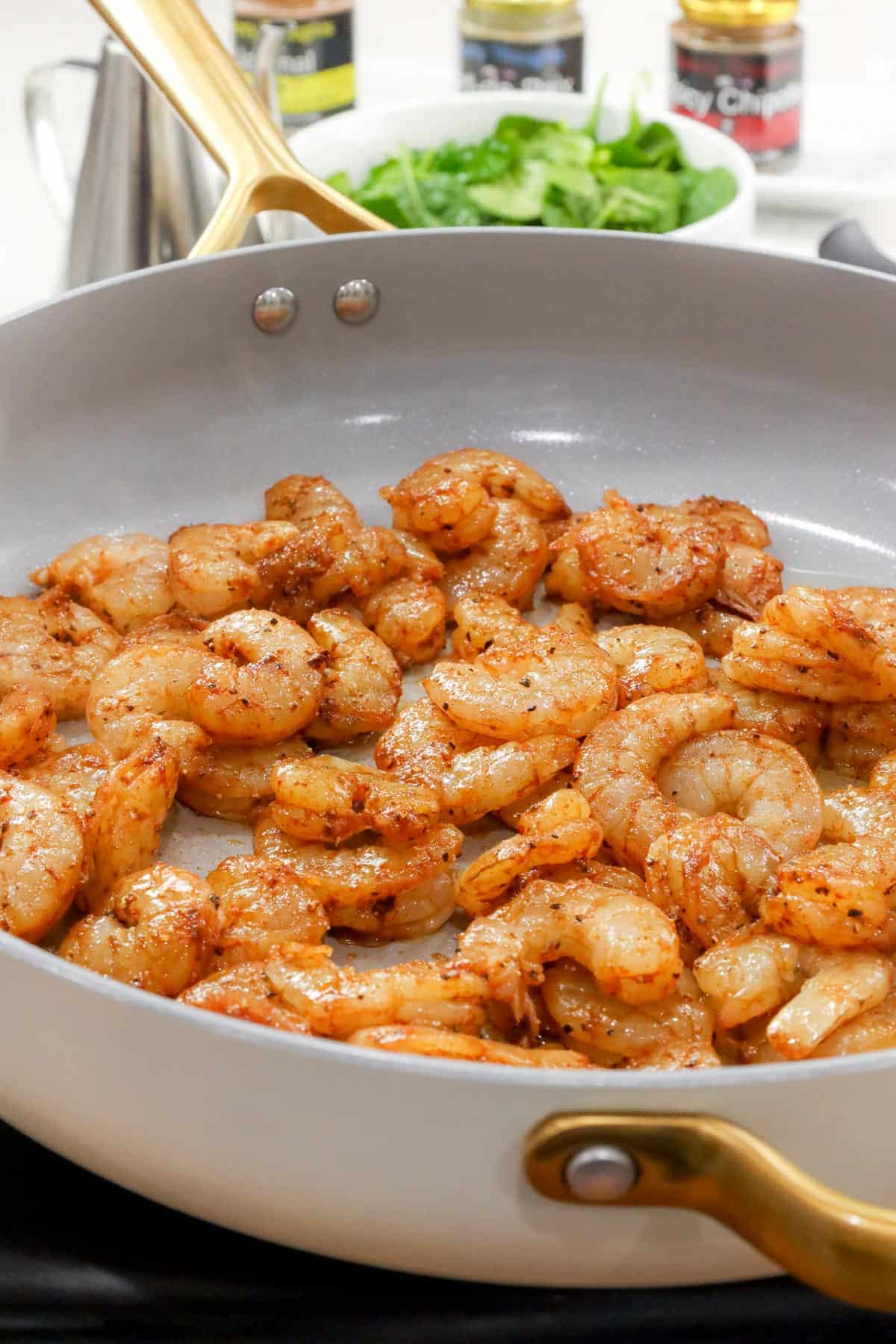 Shrimp cooking in skillet