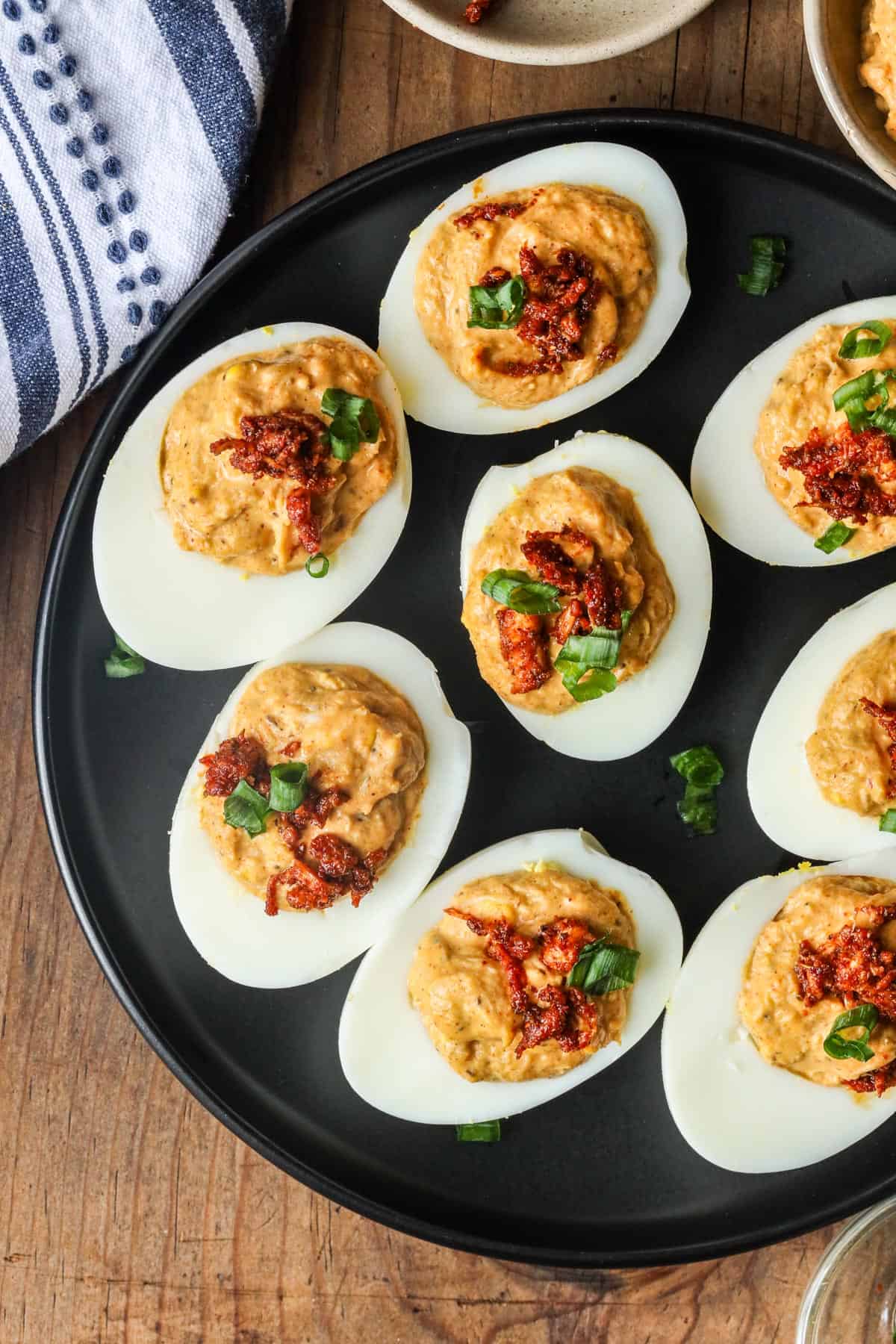 deviled eggs with crab meat topped with chives