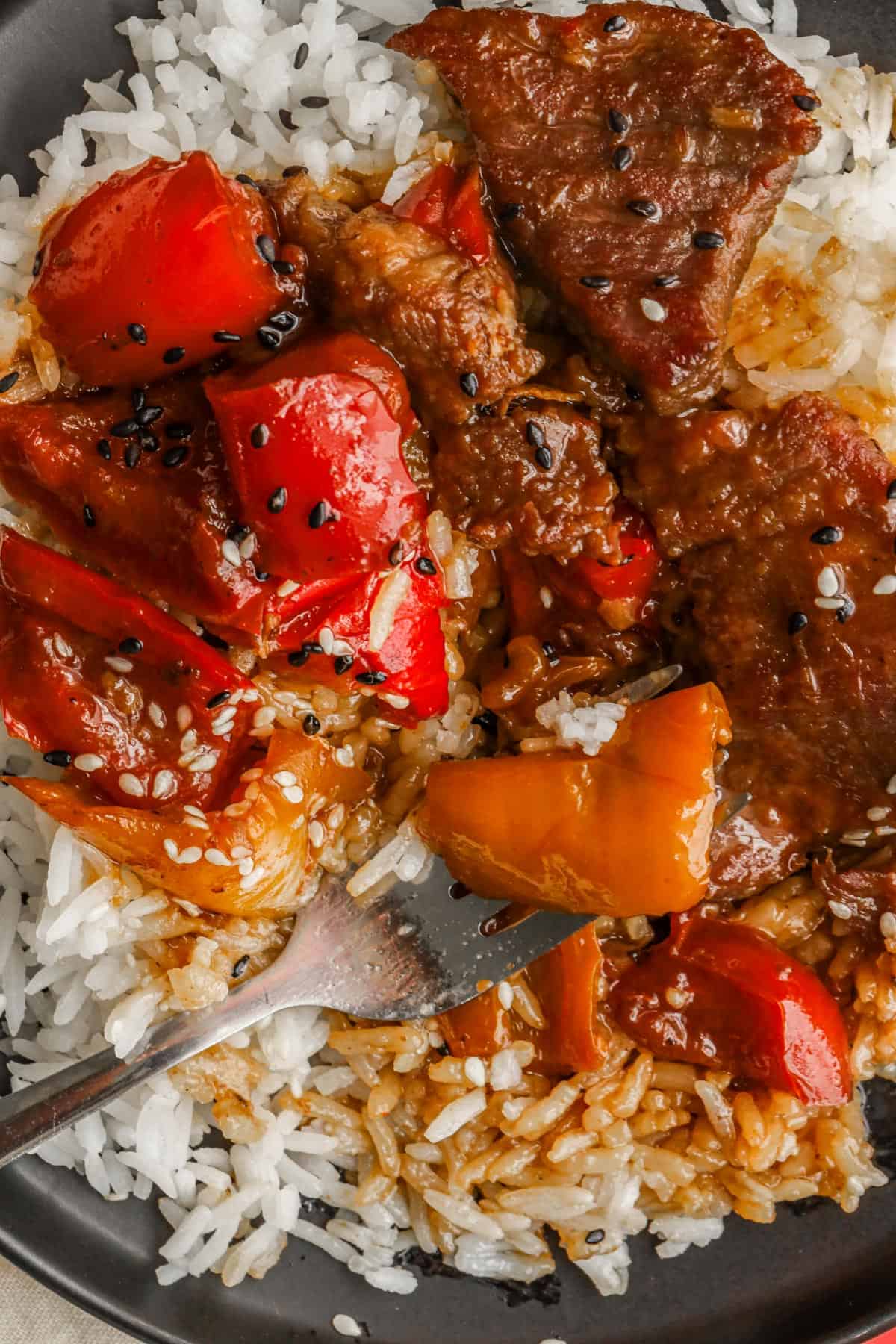 Pepper Steak and Rice topped with sesame seeds