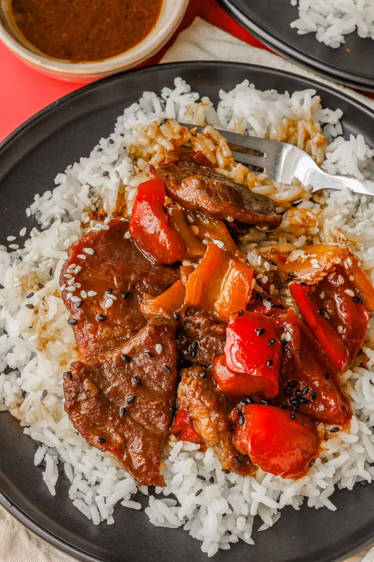 Pepper Steak and Rice topped with sesame seeds
