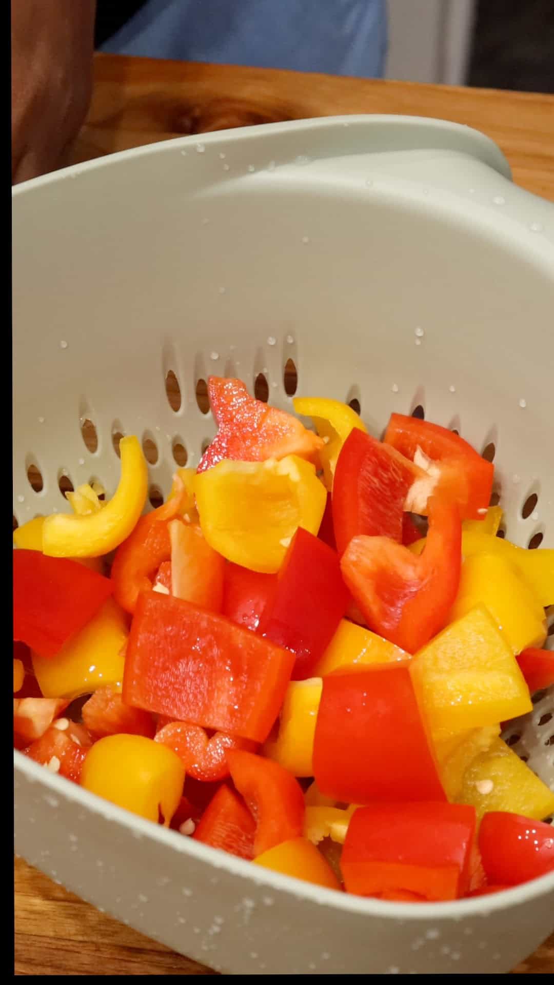 yellow and red bell pepper slices in basket