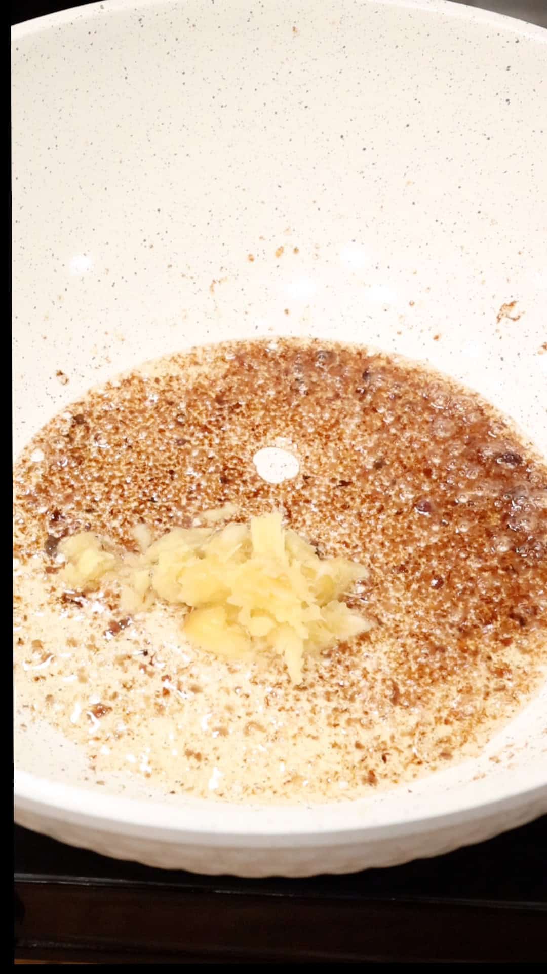 Sauté minced garlic