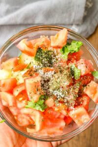 Cucumber and Tomato Salad in glass bowl - ingredients