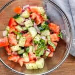 Cucumber and Tomato Salad in glass bowl