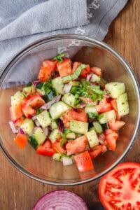 Cucumber and Tomato Salad in glass bowl