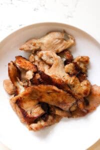 cooked chicken in white plate
